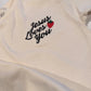 Embroidered "Jesus Loves You" Tee